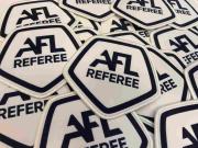 Партия судейских шевронов AFL с надёжной оверлочной обработкой по контуру, обеспечивающей долговечность изделия